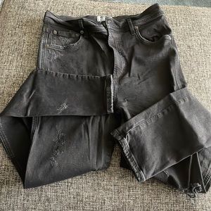 Agolde’s Roxanne Super High Rise Skinny Jean in black; distressing on legs